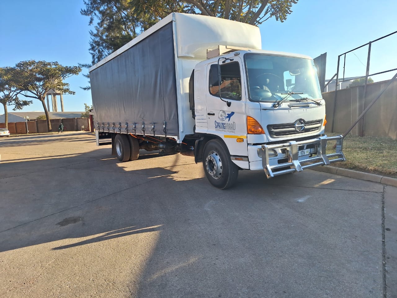Springboard International Shipping truck carrying cargo to Zimbabwe